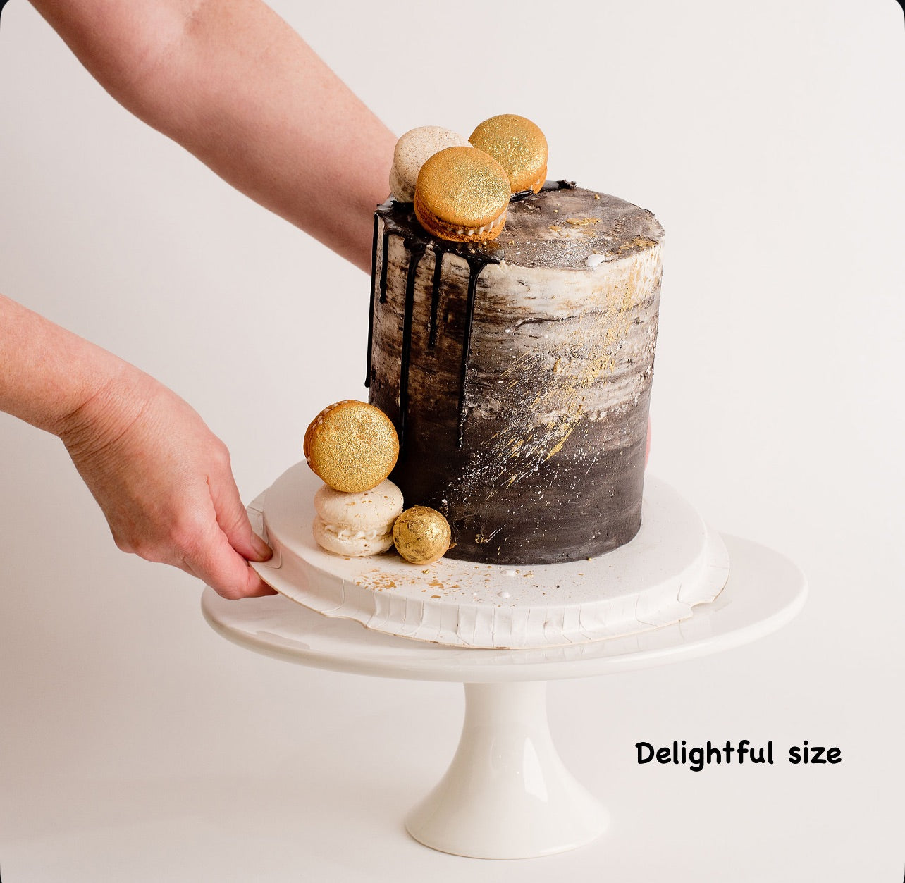 Black and gold cake. Great for male birthday cake. Ombre black drip, macarons and gold glitter. Made by Cute Cakes & Co . Brisbane best cake shop.5 start reviews