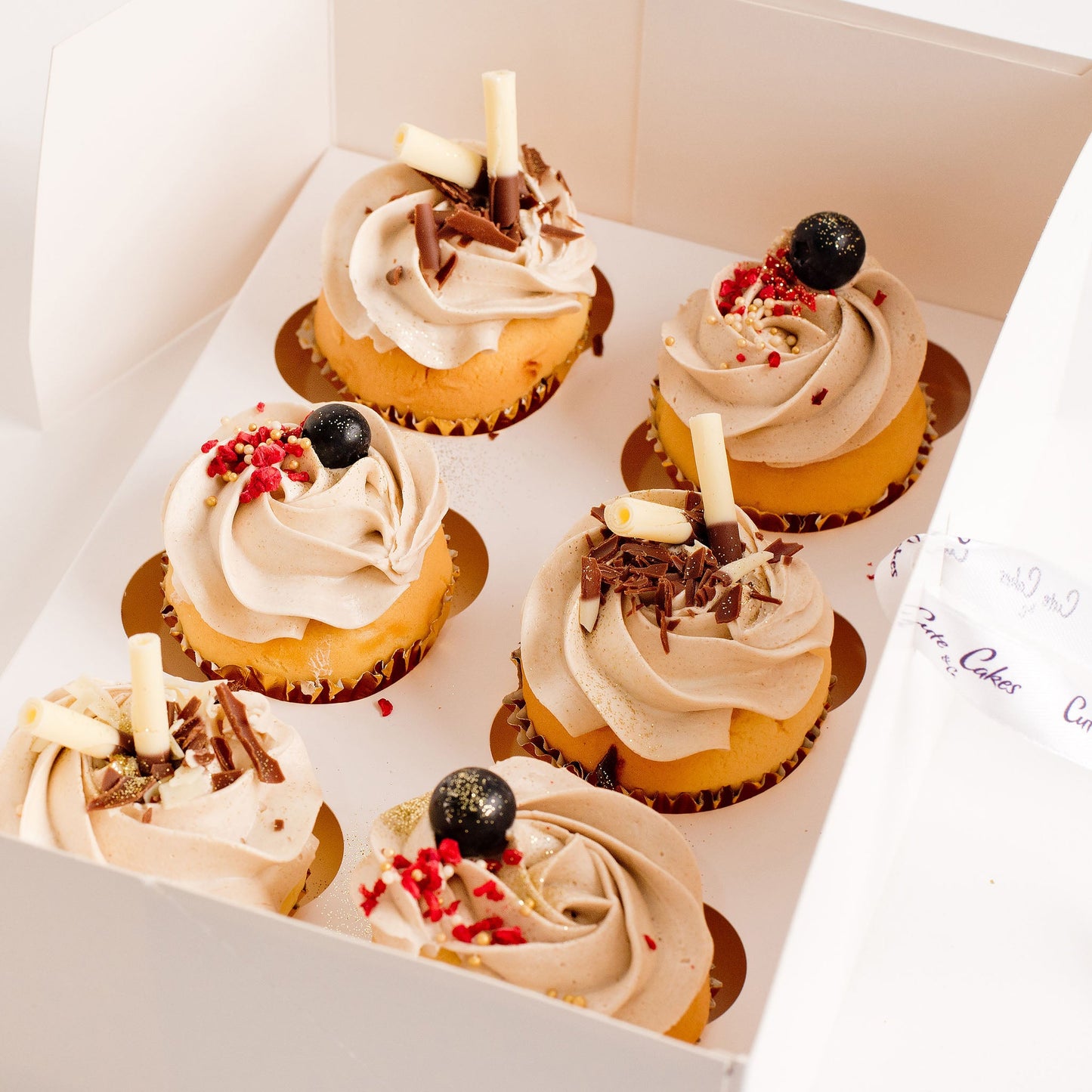 Delicious box of 6 cupcakes with caramel buttercream, fruit decorations and chocolate. Designed to match the Aubrey cake.
Beautiful birthday cakes and cupcakes, Cute Cakes and Co, Brisbane