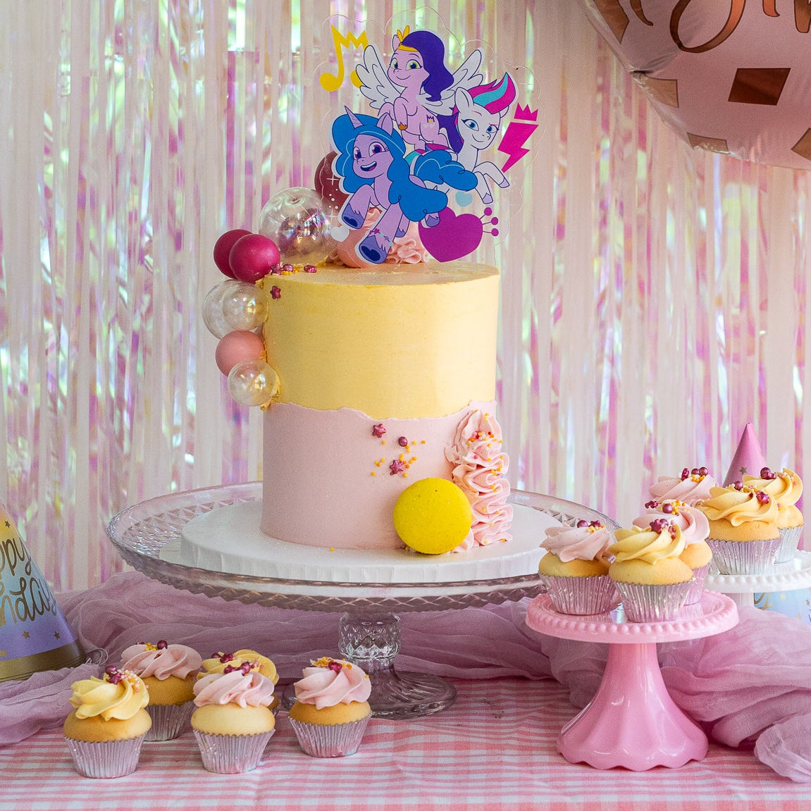 A party set up with my little pony cake toppers pink and yellow cake cupcakes streamers. Made with love by Cute Cakes & Co, Brisbane Favourite cake shop.
5 star review cake shop in Brisbane.