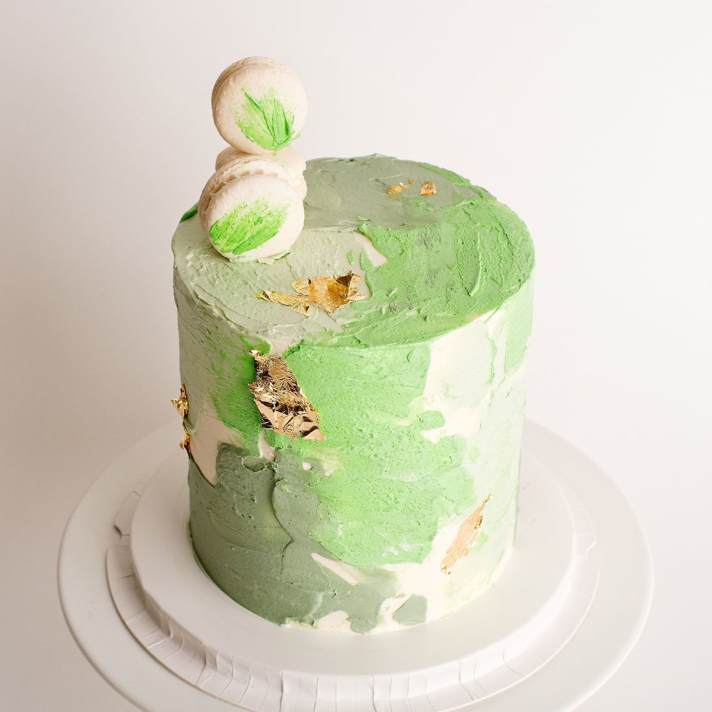 Buttercream cake decorated with silver leaf and macarons, cakes for men, cakes for boys, boy birthday cakes, birthday cakes, Brisbane cakes, Brisbane cakes, cakes home delivered, cakes home-delivered, Brisbane home delivered cakes, Brisbane home-delivered cupcakes, Cute Cakes & Co, Cute Cakes and Co