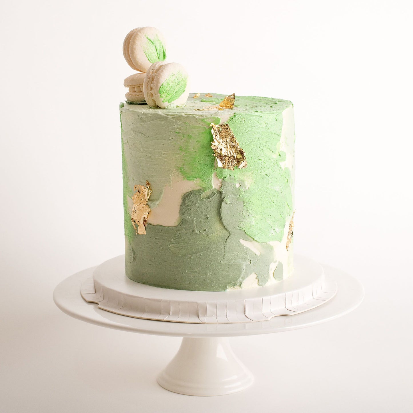 Buttercream cake decorated with silver leaf and macarons, cakes for men, cakes for boys, boy birthday cakes, birthday cakes, Brisbane cakes, Brisbane cakes, cakes home delivered, cakes home-delivered, Brisbane home delivered cakes, Brisbane home-delivered cupcakes, Cute Cakes & Co, Cute Cakes and Co