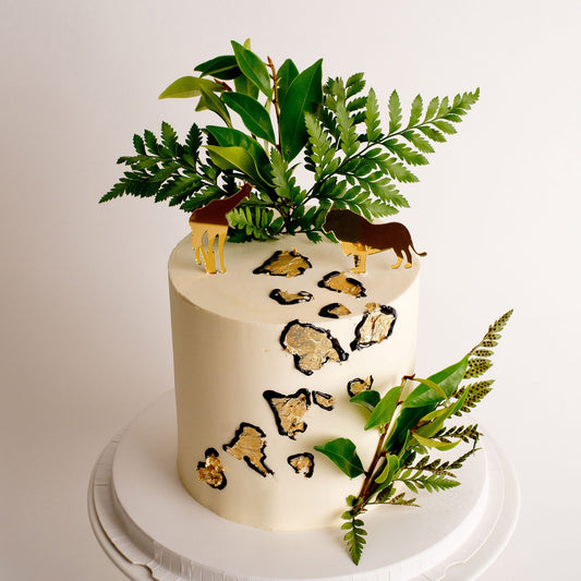Cute Cakes and co, Cakes near me, Boys cakes, jungle cakes, gold leaf, wild one cake, Buttercream cakes, Gold animal toppers