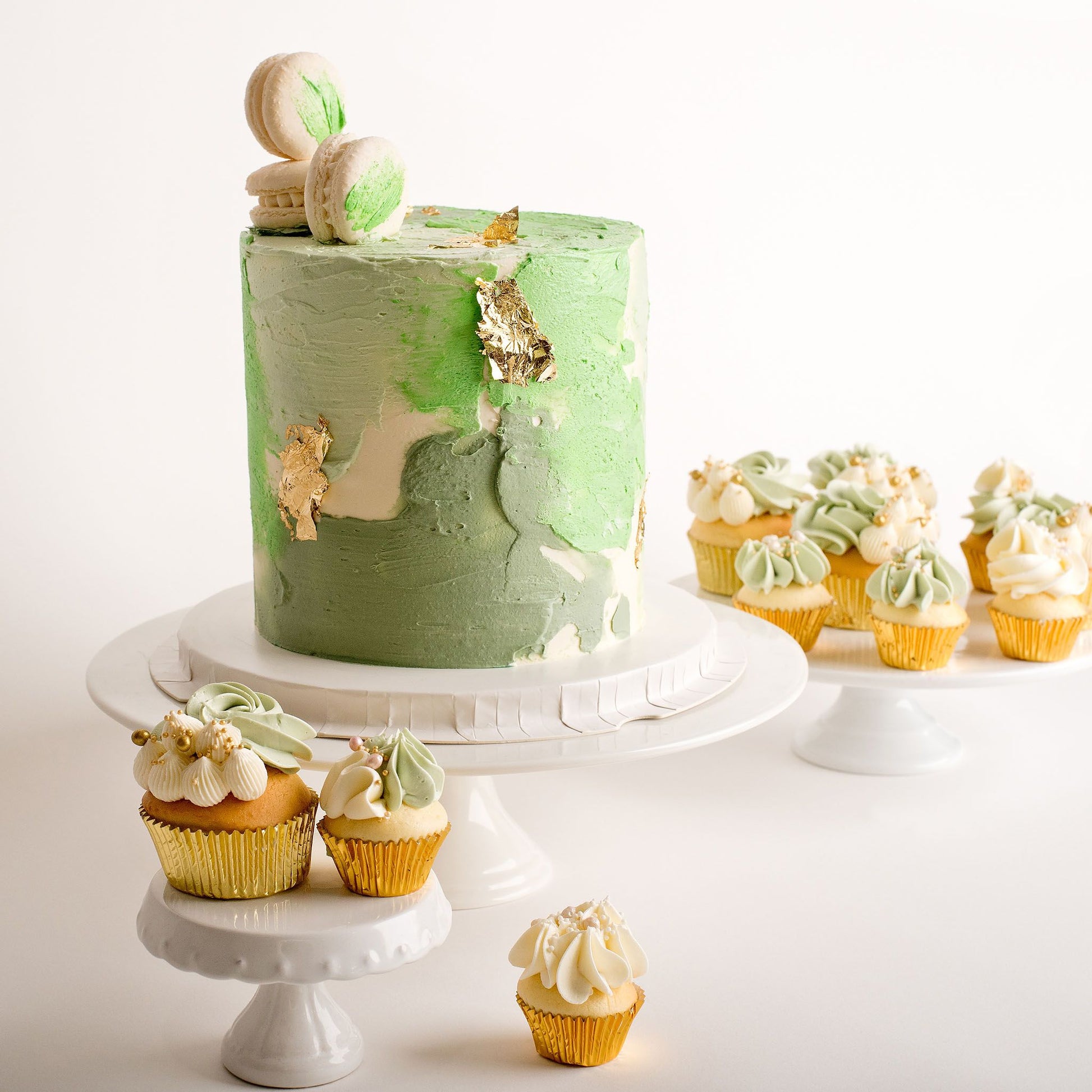 Buttercream cake decorated with silver leaf and macarons, cakes for men, cakes for boys, boy birthday cakes, birthday cakes, Brisbane cakes, Brisbane cakes, cakes home delivered, cakes home-delivered, Brisbane home delivered cakes, Brisbane home-delivered cupcakes, Cute Cakes & Co, Cute Cakes and Co