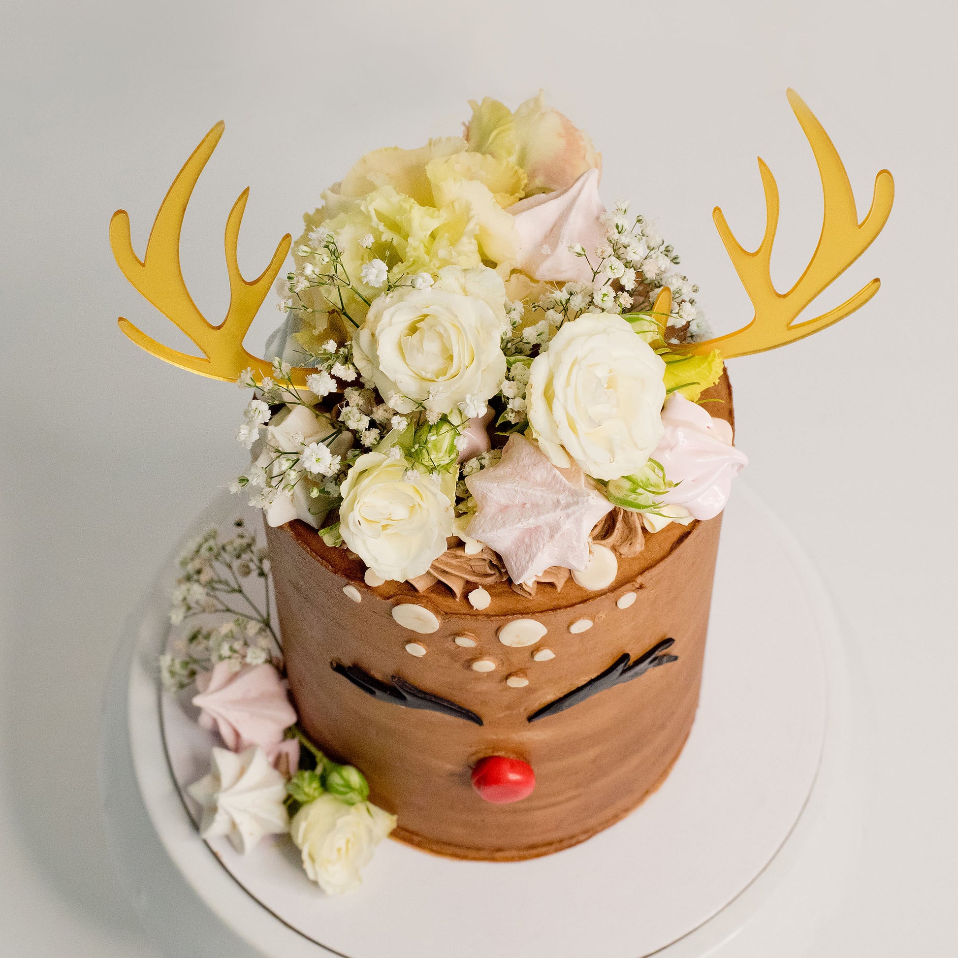 Celebrate Christmas with the fun cake - Rudolf the red nose dear. Christmas cakes Brisbane, birthday cakes Brisbane, cakes Brisbane cake shops Brisbane, cupcakes Brisbane, cake shop Brisbane, Cute Cakes & Co, Cute Cakes and Co