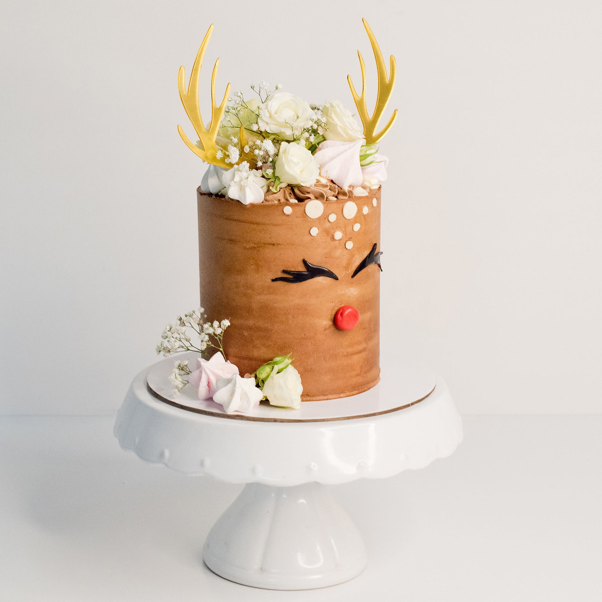 Celebrate Christmas with the fun cake - Rudolf the red nose dear. Christmas cakes Brisbane, birthday cakes Brisbane, cakes Brisbane cake shops Brisbane, cupcakes Brisbane, cake shop Brisbane, Cute Cakes & Co, Cute Cakes and Co