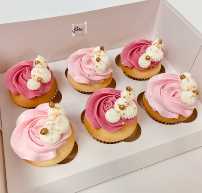 Delicious light pink and darker pink buttercream vanilla cupcakes with white and gold detail. Made by Cute Cakes and Co. Brisbane cake shop near you. Same day orders. Deliver to your door 