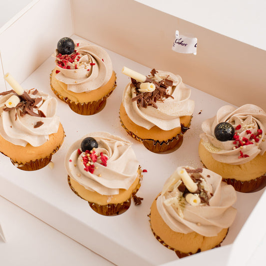 Delicious box of 6 cupcakes with caramel buttercream, fruit decorations and chocolate. Designed to match the Aubrey cake. 
Beautiful birthday cakes and cupcakes, Cute Cakes and Co, Brisbane 