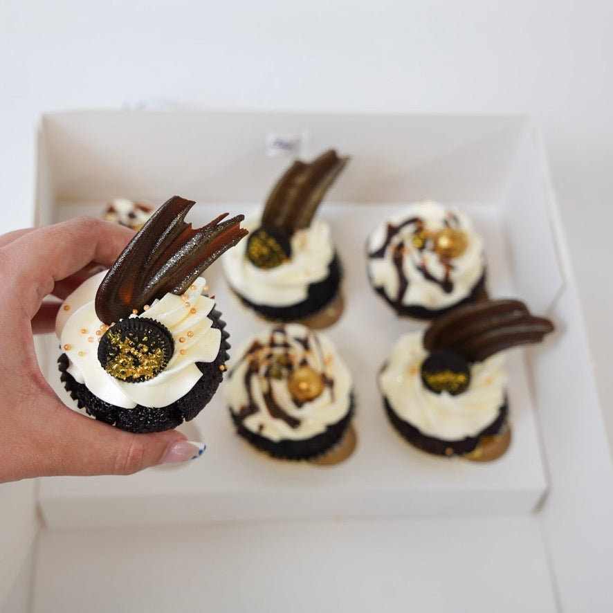6 pack of delicious Chocolate cupcakes with white buttercream, chocolate sails, Oreo and golden maltesters. 
Made by Cute Cakes & Co.  5 star cake shop in Brisbane. 
Same day ordering available. Delivery available