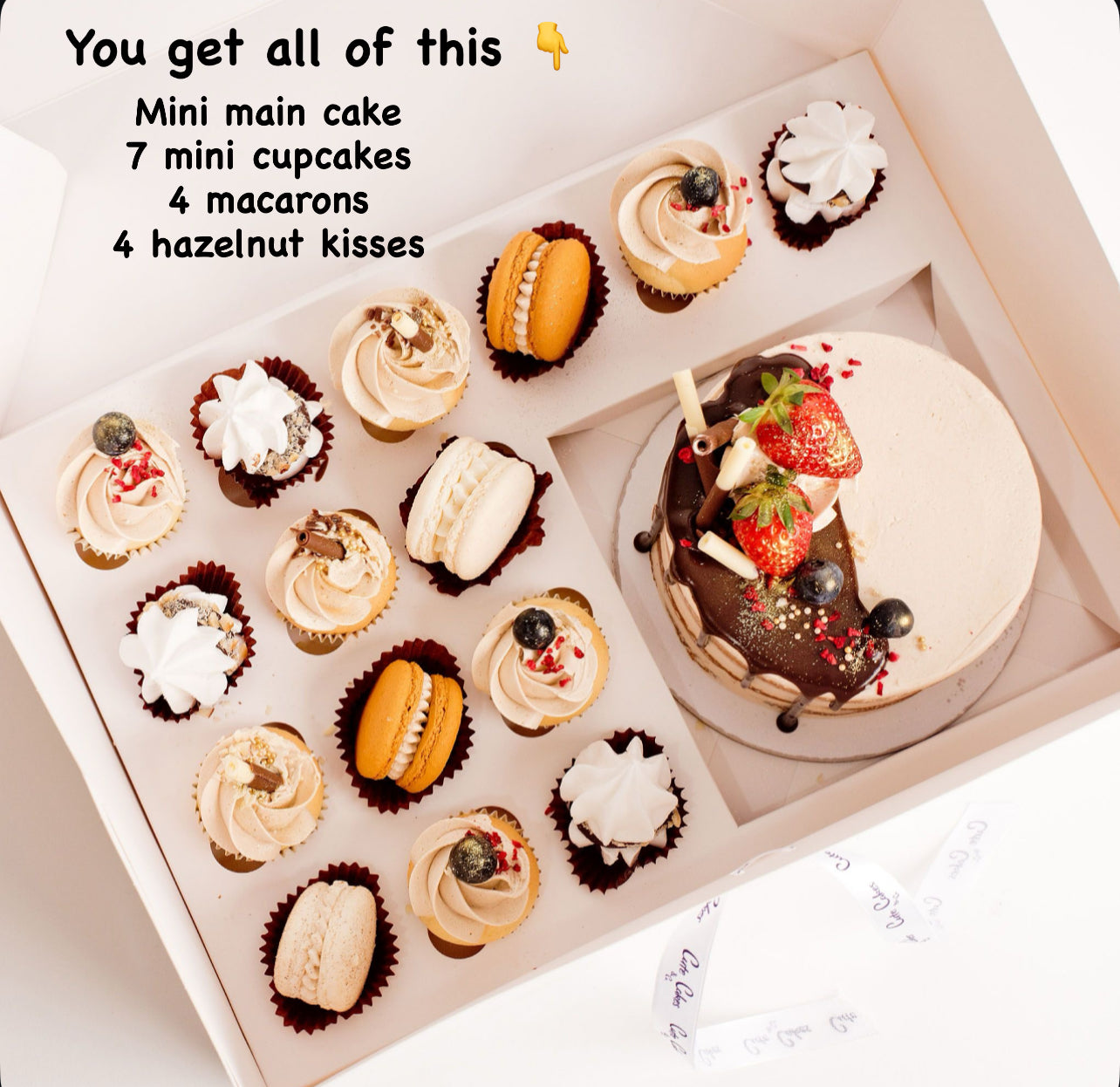 Cute cake and cupcake pack. Semi-naked caramel mini cake with gorgeous buttercream icing, seasonal fruit, chocolate sail and delicious dripping gold. Plus 7 mini cupcakes, 4 hazelnut kisses and 4 macarons. Ideal for work and corporate party celebrations. Cute Cakes & Co, Cute Cakes and Co, Brisbane online cake shop, mans birthday cake, Chocolate drip cake.