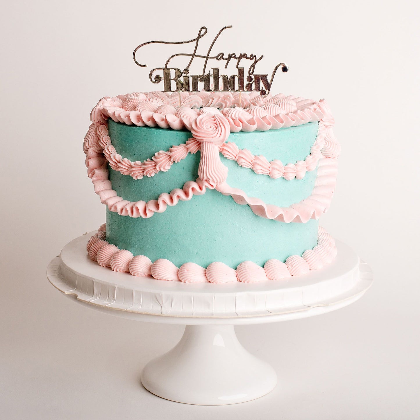 Bridgerton-inspired mini birthday cake vintage cake with Tiffany teal and pink Italian buttercream