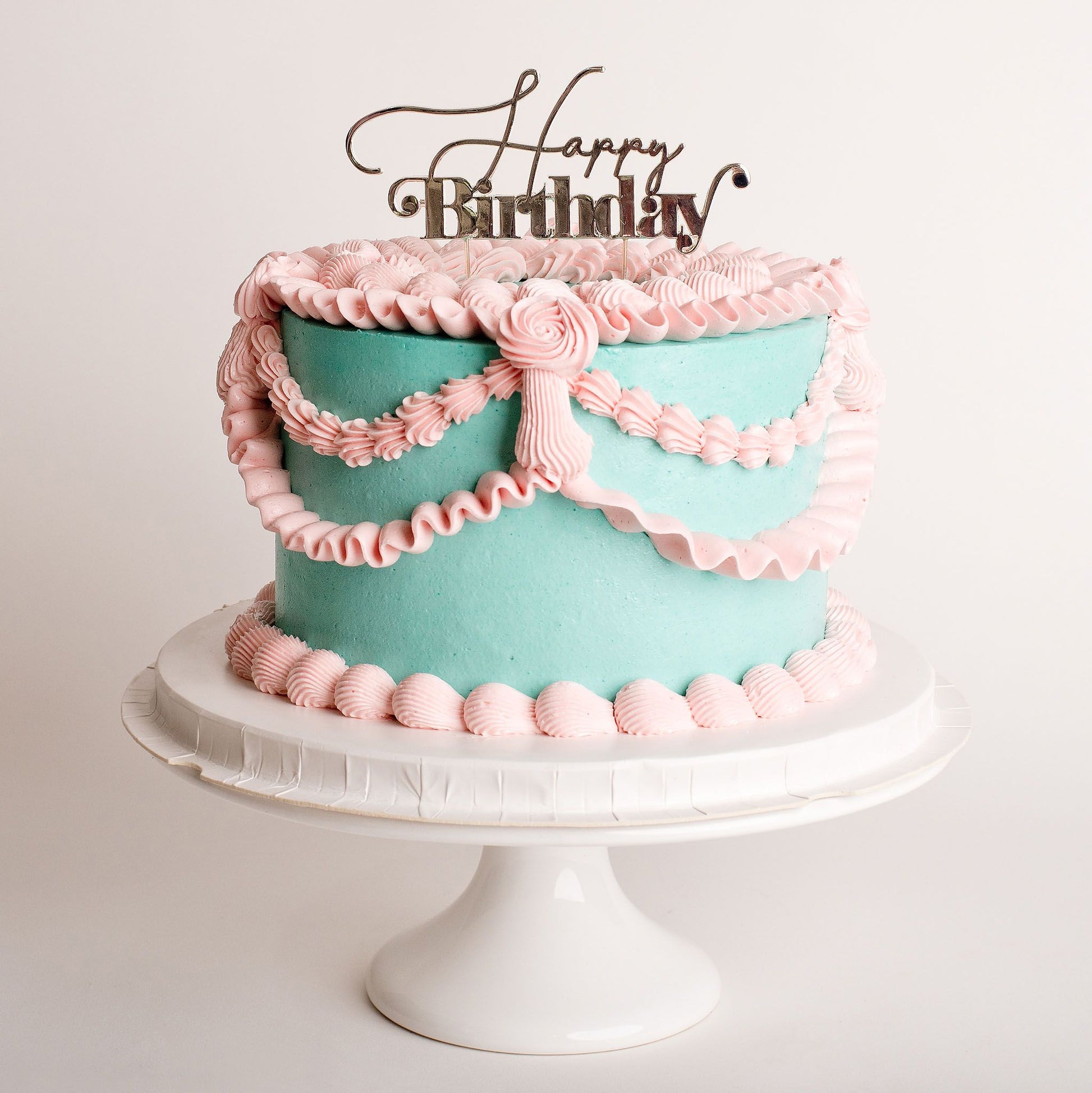 Bridgerton-inspired mini birthday cake vintage cake with Tiffany teal and pink Italian buttercream