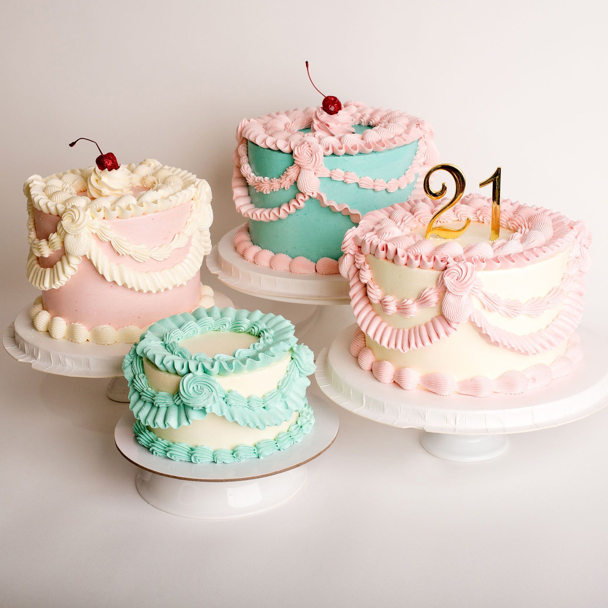 Vintage cakes Hand-piped in Buttercream  with custom colours