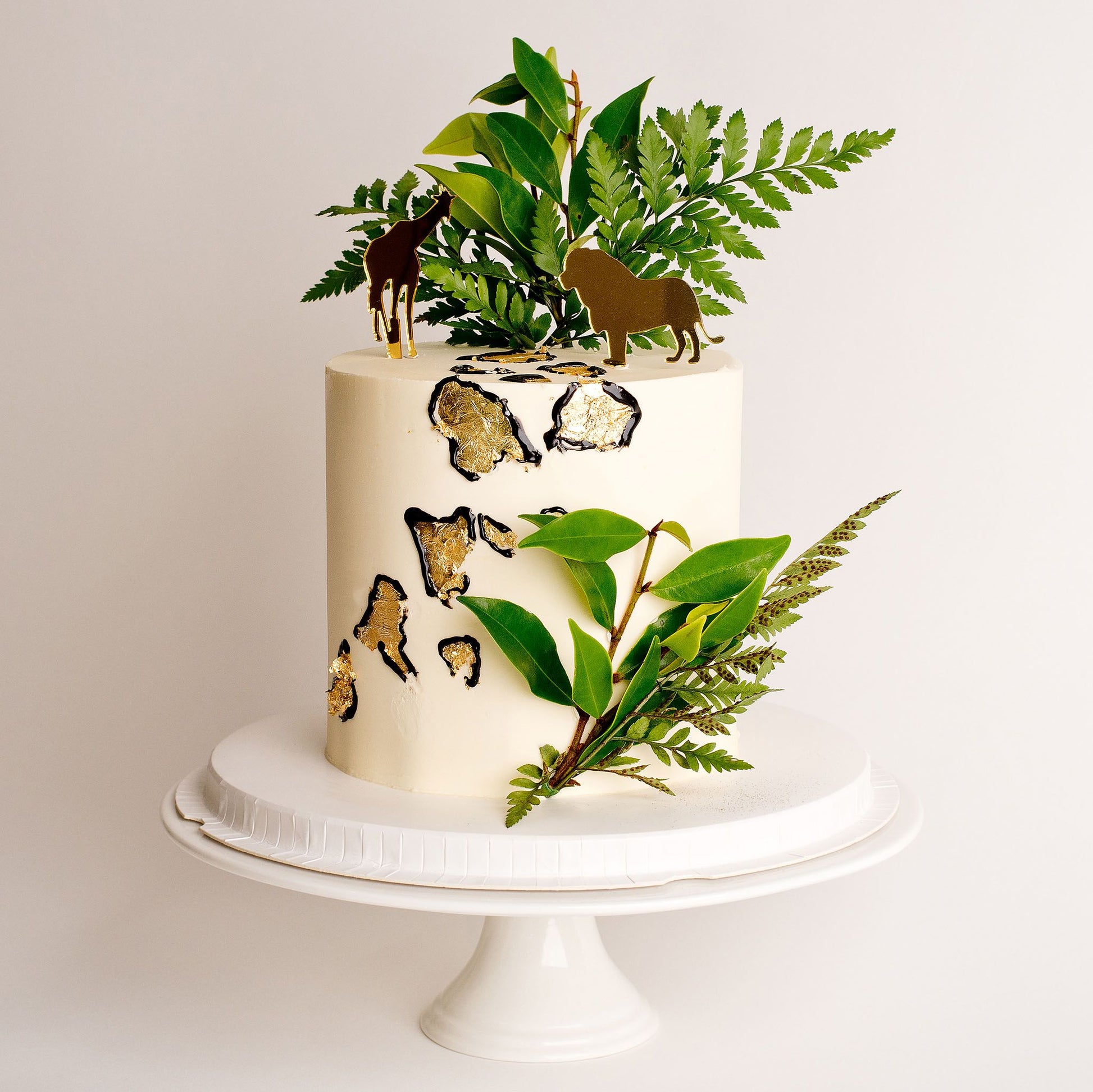 Cute Cakes and co, Cakes near me, Boys cakes, jungle cakes, gold leaf, wild one cake, Buttercream cakes, Gold animal toppers