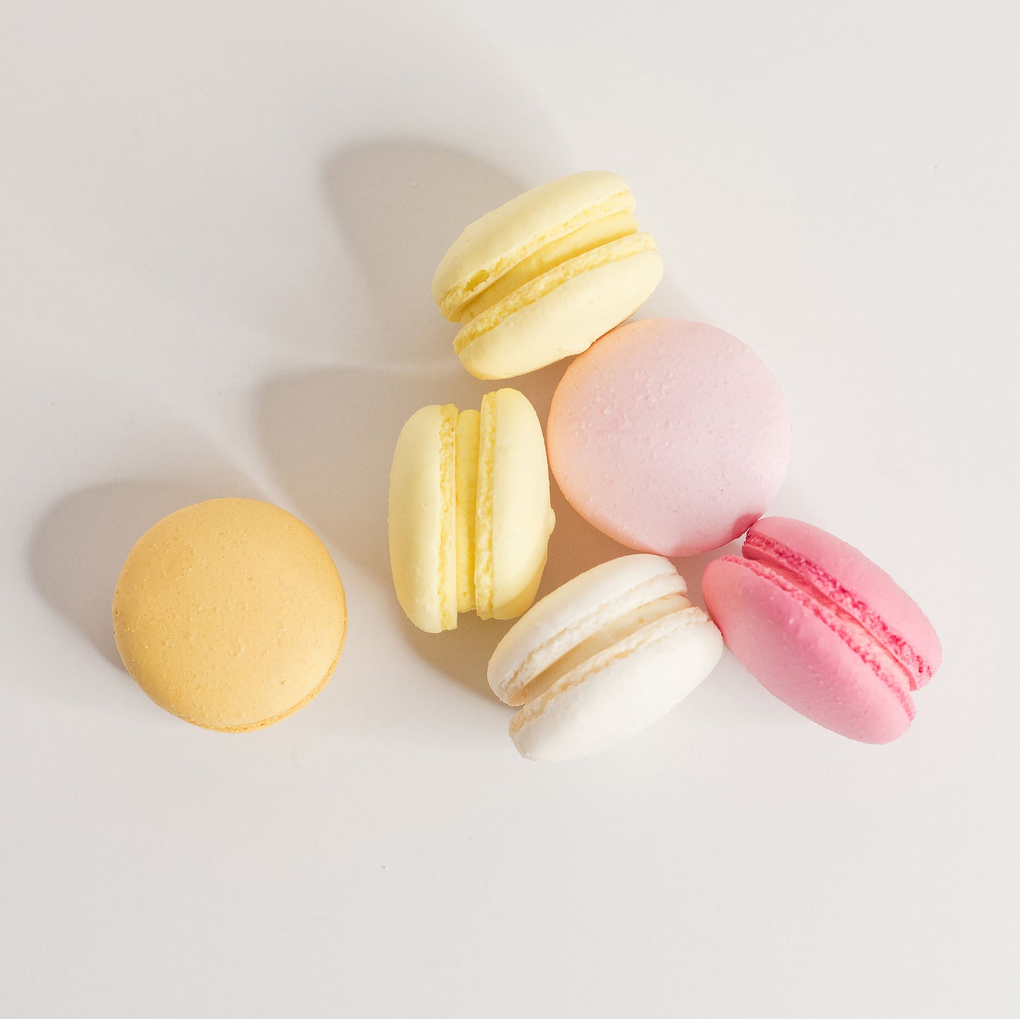 macarons, macaroons Raspberry pink, Vanilla white, Lemon yellow, Caramel, Mixed flavours macarons, Brisbane macarons, Brisbane macaroons, cakes home delivered, cakes home-delivered, Brisbane home delivered cakes, Brisbane home delivered macarons, Cute Cakes & Co, Cute Cakes and Co