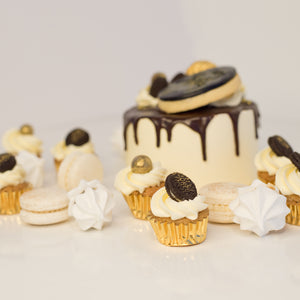 Cute cake and cupcake pack. This cake has silky chocolate dripping over vanilla buttercream icing. Plus mini cupcakes, meringue kisses and macarons. Ideal for work and corporate birthday celebrations. Cute Cakes & Co, Cute Cakes and Co, Brisbane online cake shop, Caxton Street cake shop