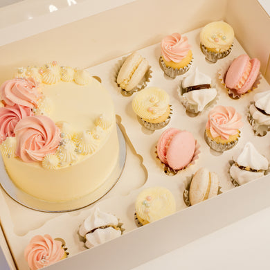 Cute cake and cupcake pack. Pretty pink and white cake decorated with tasty buttercream. Plus mini cupcakes, meringue kisses and macarons. Ideal for work and corporate birthday celebrations. Cute Cakes & Co, Cute Cakes and Co, Brisbane online cake shop, Caxton Street cake shop