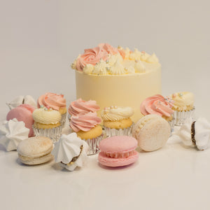 Cute cake and cupcake pack. Pretty pink and white cake decorated with tasty buttercream. Plus mini cupcakes, meringue kisses and macarons. Ideal for work and corporate birthday celebrations. Cute Cakes & Co, Cute Cakes and Co, Brisbane online cake shop, Caxton Street cake shop