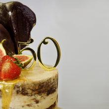 Load image into Gallery viewer, Decadent birthday cake and celebration cakes. This caramel cake tastes amazing and looks beautiful with its semi-naked butter cream icing, chocolate decoration and gold dripping! Cute Cakes &amp; Co, Cute Cakes and Co, Cute Cakes Co
